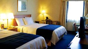 Desk, blackout curtains, free cots/infant beds, rollaway beds