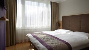 Premium bedding, down comforters, in-room safe, desk