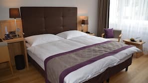 Premium bedding, down comforters, in-room safe, desk