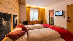 Biancheria da letto di alta qualità, materassi a doppio strato, minibar