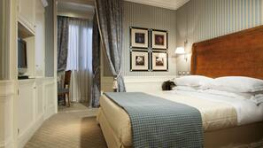 Premium bedding, down comforters, in-room safe, desk