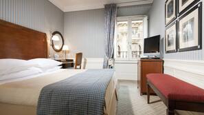 Premium bedding, down comforters, in-room safe, desk