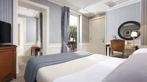 Premium bedding, down comforters, in-room safe, desk