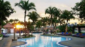 Outdoor pool, open 6:00 AM to 11:00 PM, pool umbrellas, pool loungers