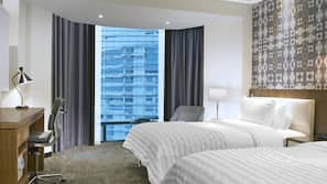 Premium bedding, pillow top beds, minibar, in-room safe