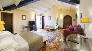 Premium bedding, free minibar items, in-room safe, desk