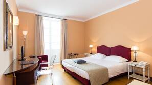 Premium bedding, free minibar items, in-room safe, desk