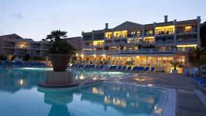 Seasonal outdoor pool, pool umbrellas, pool loungers