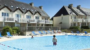 Seasonal outdoor pool, pool umbrellas, pool loungers