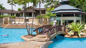 2 outdoor pools, open 8:00 AM to 7:00 PM, pool umbrellas, pool loungers