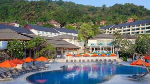 2 outdoor pools, open 8:00 AM to 7:00 PM, pool umbrellas, pool loungers