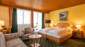 Premium bedding, down comforters, in-room safe, desk