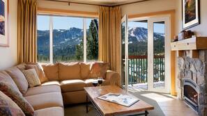 Flat-screen TV, fireplace, DVD player, pay movies