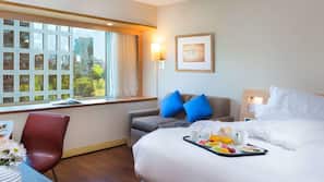 Premium bedding, pillow top beds, minibar, in-room safe