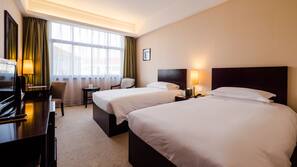 Minibar, desk, blackout drapes, iron/ironing board