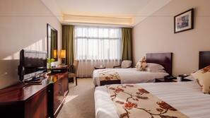 Minibar, desk, blackout drapes, iron/ironing board