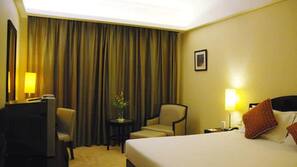 Minibar, desk, blackout drapes, iron/ironing board