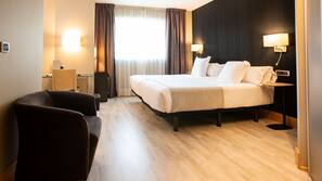 Ropa de cama de alta calidad, minibar, caja fuerte