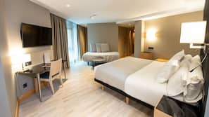 Ropa de cama de alta calidad, minibar, caja fuerte