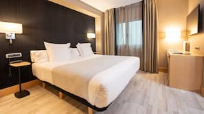 Ropa de cama de alta calidad, minibar, caja fuerte