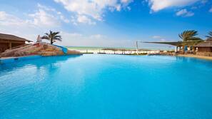 2 outdoor pools, pool umbrellas, pool loungers