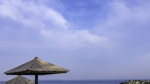Private beach, white sand, sun-loungers, beach umbrellas