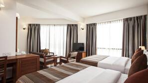 Egyptian cotton sheets, premium bedding, minibar, in-room safe