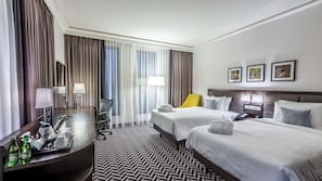Premium bedding, memory foam beds, in-room safe, desk