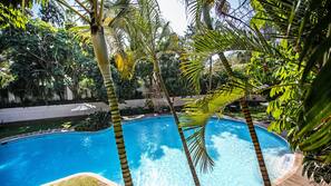 Outdoor pool, pool umbrellas, sun loungers
