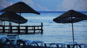 Beach nearby, sun loungers, beach umbrellas
