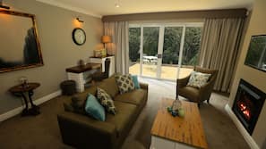 LCD TV, fireplace, DVD player, iPod docking station