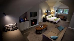 LCD TV, fireplace, DVD player, iPod docking station