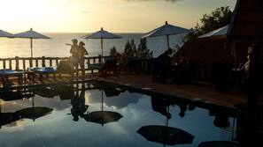 Outdoor pool, pool umbrellas, pool loungers
