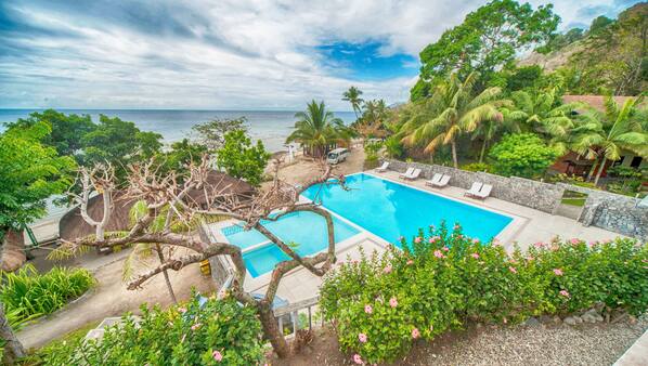 Outdoor pool, pool umbrellas, sun loungers