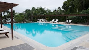 Outdoor pool, pool umbrellas, sun loungers