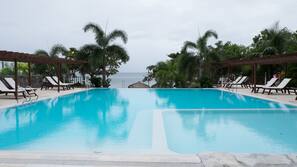 Outdoor pool, pool umbrellas, sun loungers
