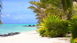 On the beach, white sand, beach towels, snorkelling