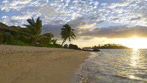 On the beach, white sand, beach towels, snorkelling