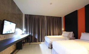 Blackout drapes, rollaway beds, free WiFi