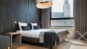 Literie hypoallergénique, minibar, coffre-forts dans les chambres