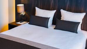 Literie hypoallergénique, minibar, coffre-forts dans les chambres