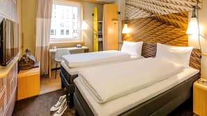 Premium bedding, pillowtop beds, desk, blackout drapes