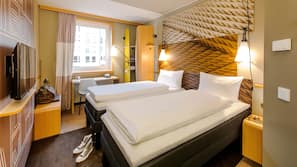 Premium bedding, pillowtop beds, desk, blackout drapes