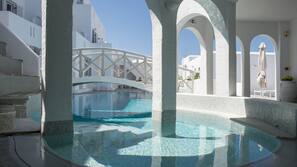 Outdoor pool, pool umbrellas, sun loungers