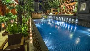 Outdoor pool, open 9:00 AM to 6:00 PM, pool umbrellas, pool loungers