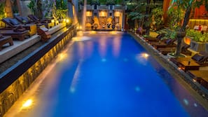 Outdoor pool, open 9:00 AM to 6:00 PM, pool umbrellas, pool loungers