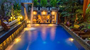 Outdoor pool, open 9:00 AM to 6:00 PM, pool umbrellas, pool loungers