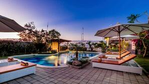 Outdoor pool, pool umbrellas, pool loungers