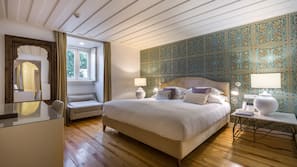 Premium bedding, down duvets, pillow-top beds, free minibar items