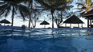 Outdoor pool, pool umbrellas, pool loungers